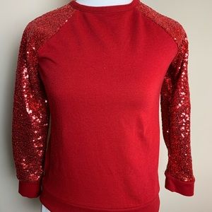 Girls red sweater with sequence sleeves